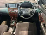 2004 Toyota Corolla Luxel Silver Sedan for sale, Japanese used car export - photo 6 of 11 | GULJI TRADERS