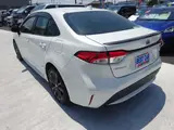 2019 Toyota Corolla 1.8 Hybrid WxB Pearl Sedan for sale, Japanese used car export - photo 8 of 45 | GULJI TRADERS