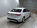 2019 Toyota Corolla Hybrid S Pearl Sedan for sale, Japanese used car export - photo 2 of 5 | GULJI TRADERS
