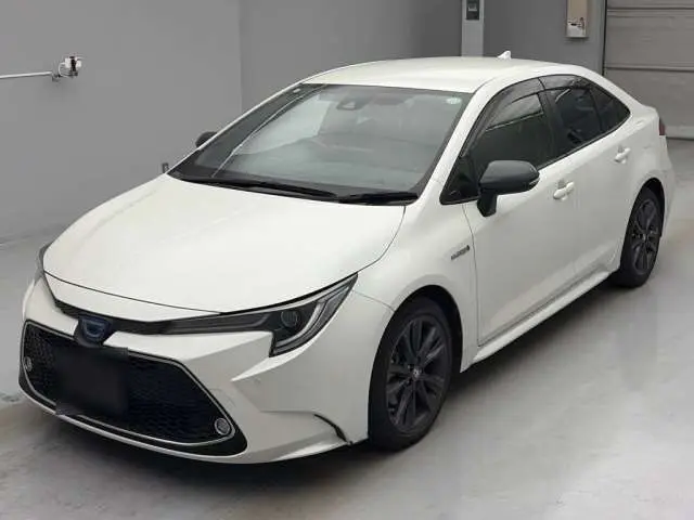 2019 Toyota Corolla Hybrid Double By Pearl Sedan for sale, Japanese used car export - photo 1 of 10 | GULJI TRADERS