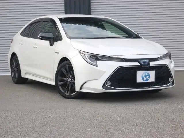 2019 Toyota Corolla Hybrid WxB Cold Weather Specification Rear Pearl Sedan for sale, Japanese used car export - photo 1 of 9 | GULJI TRADERS