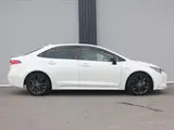 2019 Toyota Corolla Hybrid WxB Cold Weather Specification Rear Pearl Sedan for sale, Japanese used car export - photo 4 of 9 | GULJI TRADERS