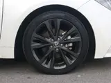 2019 Toyota Corolla Hybrid WxB Cold Weather Specification Rear Pearl Sedan for sale, Japanese used car export - photo 9 of 9 | GULJI TRADERS