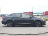 2019 Toyota Corolla Hybrid WxB Safety Sense Black Sedan for sale, Japanese used car export - photo 4 of 9 | GULJI TRADERS