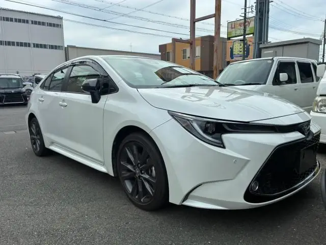 2019 Toyota Corolla Double Bye White Sedan for sale, Japanese used car export - photo 1 of 9 | GULJI TRADERS