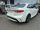 2019 Toyota Corolla Double Bye White Sedan for sale, Japanese used car export - photo 3 of 9 | GULJI TRADERS