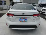 2020 Toyota Corolla 1.8 Hybrid WxB Pearl Sedan for sale, Japanese used car export - photo 4 of 48 | GULJI TRADERS