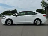 2020 Toyota Corolla Hybrid G-X 4WD White Sedan for sale, Japanese used car export - photo 11 of 36 | GULJI TRADERS