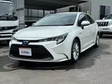 2020 Toyota Corolla Hybrid SE-FOUR Pearl Sedan for sale, Japanese used car export - photo 1 of 77 | GULJI TRADERS