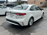 2020 Toyota Corolla Hybrid SE-FOUR Pearl Sedan for sale, Japanese used car export - photo 4 of 77 | GULJI TRADERS
