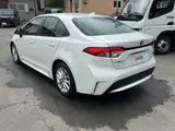 2020 Toyota Corolla Hybrid SE-FOUR Pearl Sedan for sale, Japanese used car export - photo 6 of 77 | GULJI TRADERS