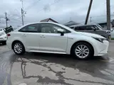 2020 Toyota Corolla Hybrid SE-FOUR Pearl Sedan for sale, Japanese used car export - photo 8 of 77 | GULJI TRADERS