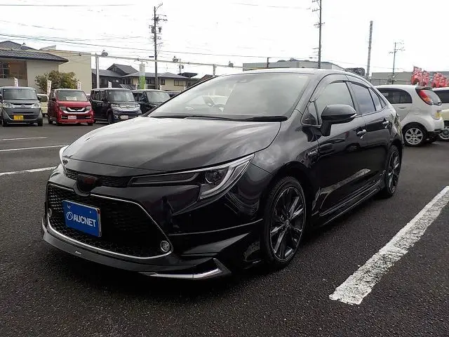 2020 Toyota Corolla Hybrid Double By Black Sedan for sale, Japanese used car export - photo 1 of 57 | GULJI TRADERS