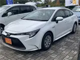 2020 Toyota Corolla Hybrid G-X 4WD White Sedan for sale, Japanese used car export - photo 1 of 45 | GULJI TRADERS