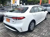 2020 Toyota Corolla Hybrid G-X 4WD White Sedan for sale, Japanese used car export - photo 4 of 45 | GULJI TRADERS