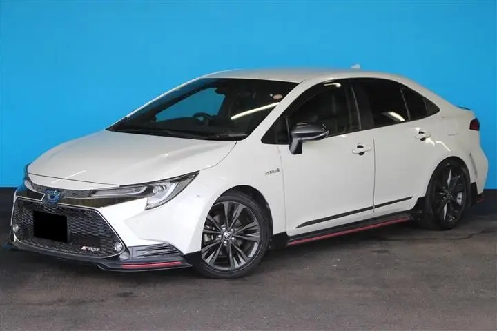 2020 Toyota Corolla 1.8HYBRID WxB Pearl Sedan for sale, Japanese used car export - photo 1 of 30 | GULJI TRADERS