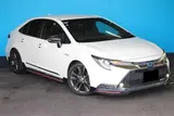 2020 Toyota Corolla 1.8HYBRID WxB Pearl Sedan for sale, Japanese used car export - photo 5 of 30 | GULJI TRADERS