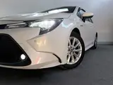 2020 Toyota Corolla 1.8HYBRID S 4WD Pearl Sedan for sale, Japanese used car export - photo 7 of 30 | GULJI TRADERS