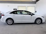 2020 Toyota Corolla 1.8HYBRID S 4WD Pearl Sedan for sale, Japanese used car export - photo 11 of 30 | GULJI TRADERS