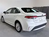 2020 Toyota Corolla 1.8HYBRID S 4WD Pearl Sedan for sale, Japanese used car export - photo 15 of 30 | GULJI TRADERS