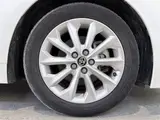 2020 Toyota Corolla 1.8HYBRID S 4WD Pearl Sedan for sale, Japanese used car export - photo 19 of 30 | GULJI TRADERS