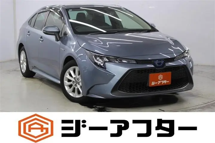 2020 Toyota Corolla 1.8HYBRID S Gray Sedan for sale, Japanese used car export - photo 1 of 30 | GULJI TRADERS