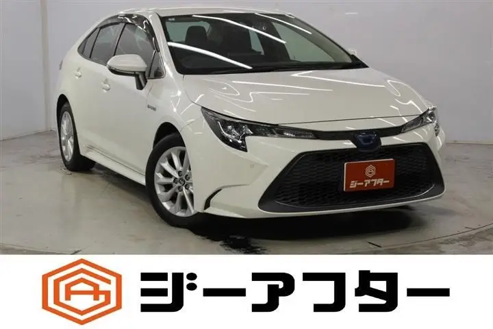2020 Toyota Corolla 1.8HYBRID S Pearl Sedan for sale, Japanese used car export - photo 1 of 30 | GULJI TRADERS
