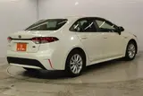 2020 Toyota Corolla 1.8HYBRID S Pearl Sedan for sale, Japanese used car export - photo 5 of 30 | GULJI TRADERS