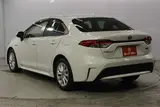 2020 Toyota Corolla 1.8HYBRID S Pearl Sedan for sale, Japanese used car export - photo 7 of 30 | GULJI TRADERS