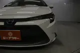 2020 Toyota Corolla 1.8HYBRID S Pearl Sedan for sale, Japanese used car export - photo 13 of 30 | GULJI TRADERS