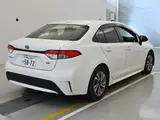 2020 Toyota Corolla Hybrid G-X White Sedan for sale, Japanese used car export - photo 2 of 12 | GULJI TRADERS