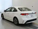 2020 Toyota Corolla Hybrid G-X White Sedan for sale, Japanese used car export - photo 6 of 12 | GULJI TRADERS