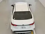2020 Toyota Corolla Hybrid G-X White Sedan for sale, Japanese used car export - photo 12 of 12 | GULJI TRADERS