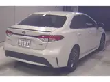 2020 Toyota Corolla Hybrid W×B Pearl Sedan for sale, Japanese used car export - photo 2 of 3 | GULJI TRADERS