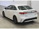 2020 Toyota Corolla Hybrid WxB Pearl Sedan for sale, Japanese used car export - photo 2 of 3 | GULJI TRADERS