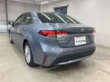 2021 Toyota Corolla 1.8 HYBRID S 4WD Gray Sedan for sale, Japanese used car export - photo 26 of 30 | GULJI TRADERS