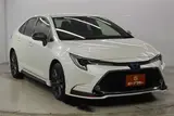 2021 Toyota Corolla 1.8 HYBRID WxB 4WD White Sedan for sale, Japanese used car export - photo 3 of 29 | GULJI TRADERS