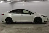 2021 Toyota Corolla 1.8 HYBRID WxB 4WD White Sedan for sale, Japanese used car export - photo 4 of 29 | GULJI TRADERS
