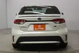 2021 Toyota Corolla 1.8 HYBRID WxB 4WD White Sedan for sale, Japanese used car export - photo 6 of 29 | GULJI TRADERS