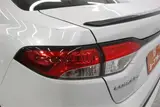 2021 Toyota Corolla 1.8 HYBRID WxB 4WD White Sedan for sale, Japanese used car export - photo 17 of 29 | GULJI TRADERS