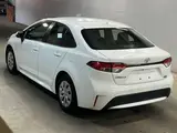 2021 Toyota Corolla G-X White Sedan for sale, Japanese used car export - photo 3 of 3 | GULJI TRADERS