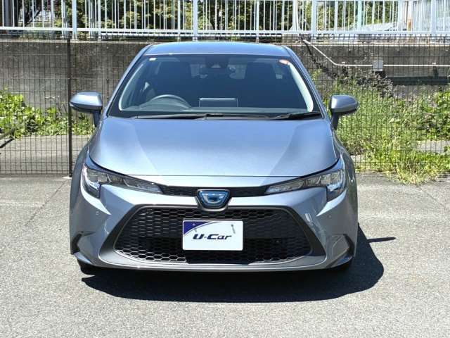 2021 Toyota Corolla Hybrid S - photo 1 2021 Toyota Corolla Hybrid S Sedan for sale, Japanese used car export - photo 1 of 12 | GULJI TRADERS