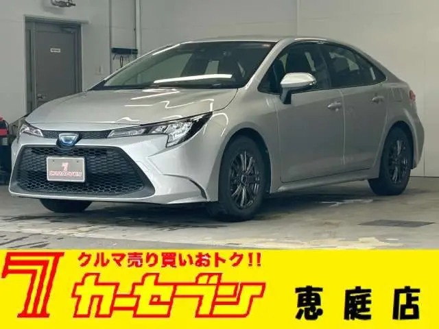 2021 Toyota Corolla 1.8 Hybrid G-X E-F - photo 1 2021 Toyota Corolla 1.8 Hybrid G-X E-F Silver Sedan for sale, Japanese used car export - photo 1 of 48 | GULJI TRADERS