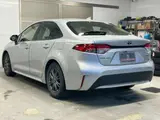 2021 Toyota Corolla 1.8 Hybrid G-X E-F Silver Sedan for sale, Japanese used car export - photo 7 of 48 | GULJI TRADERS