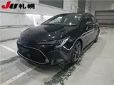 2021 Toyota Corolla 4WD Hybrid WxB Black Sedan for sale, Japanese used car export - photo 1 of 10 | GULJI TRADERS