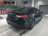 2021 Toyota Corolla 4WD Hybrid WxB Black Sedan for sale, Japanese used car export - photo 2 of 10 | GULJI TRADERS