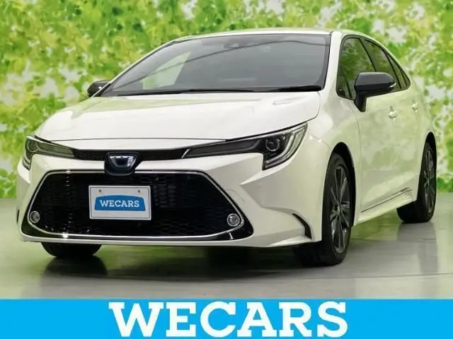 2021 Toyota Corolla Hybrid Double By - photo 1 2021 Toyota Corolla Hybrid Double By Pearl Sedan for sale, Japanese used car export - photo 1 of 9 | GULJI TRADERS