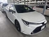 2021 Toyota Corolla Hybrid Double By Pearl Sedan for sale, Japanese used car export - photo 1 of 3 | GULJI TRADERS