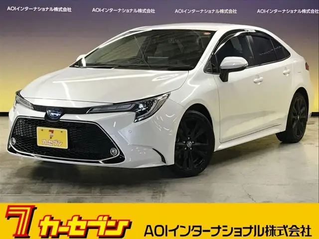 2022 Toyota Corolla 1.8 Hybrid WxB 50 Million Edition E-Four 4WD White Sedan for sale, Japanese used car export - photo 1 of 59 | GULJI TRADERS