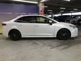 2022 Toyota Corolla 1.8 Hybrid WxB 50 Million Edition E-Four 4WD White Sedan for sale, Japanese used car export - photo 7 of 59 | GULJI TRADERS